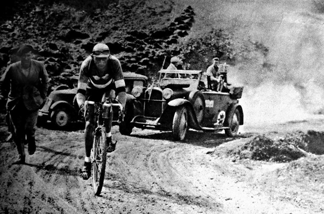 Antonin Magne, winner of Tour de France 1931 and 1934 on the unpaved riding alone in the unpaved road of Col du Aubisque in the Pyrenees during the 9th stage of Tour de France 1931 