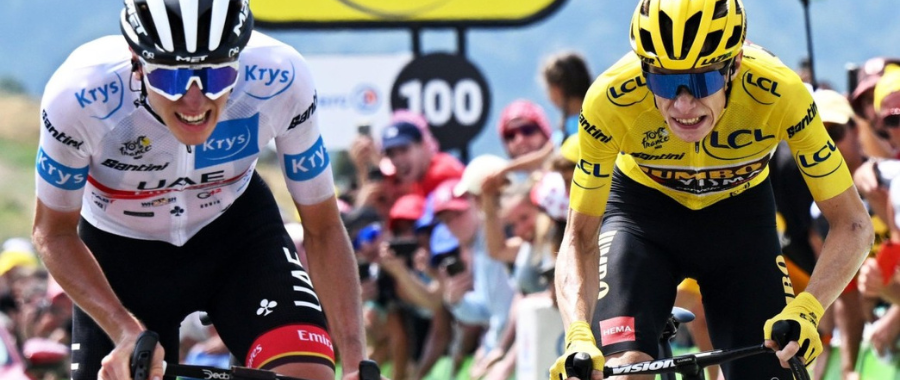 Tadej Pogacar and Jonas Vingegaard riding head to head during a mountain stage at Tour de France